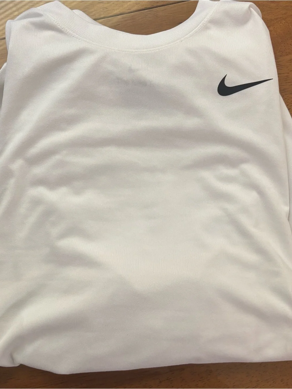 Nike White Short Sleeve Performance Tee with Black Swoosh